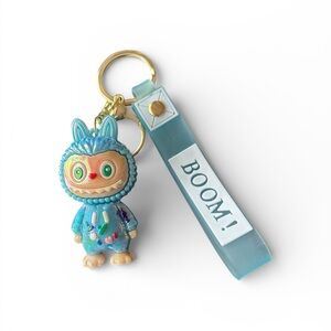 Charming Blue Monster Keychain with BOOM! Tag
